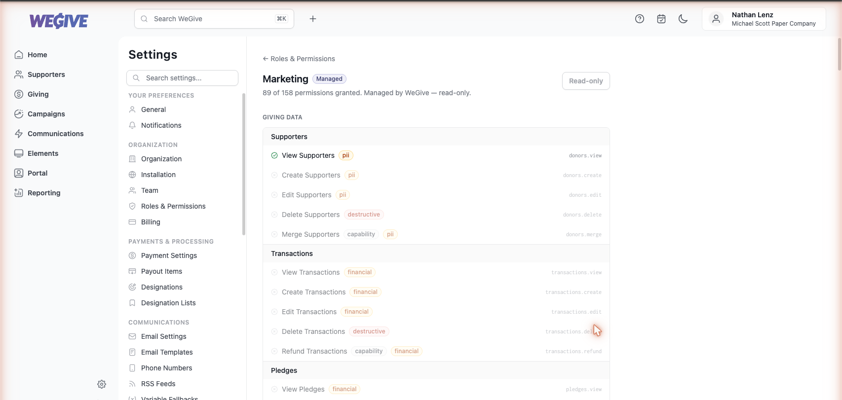 The Marketing role's permission matrix, showing granted and not-granted permissions grouped by feature with sensitivity labels.